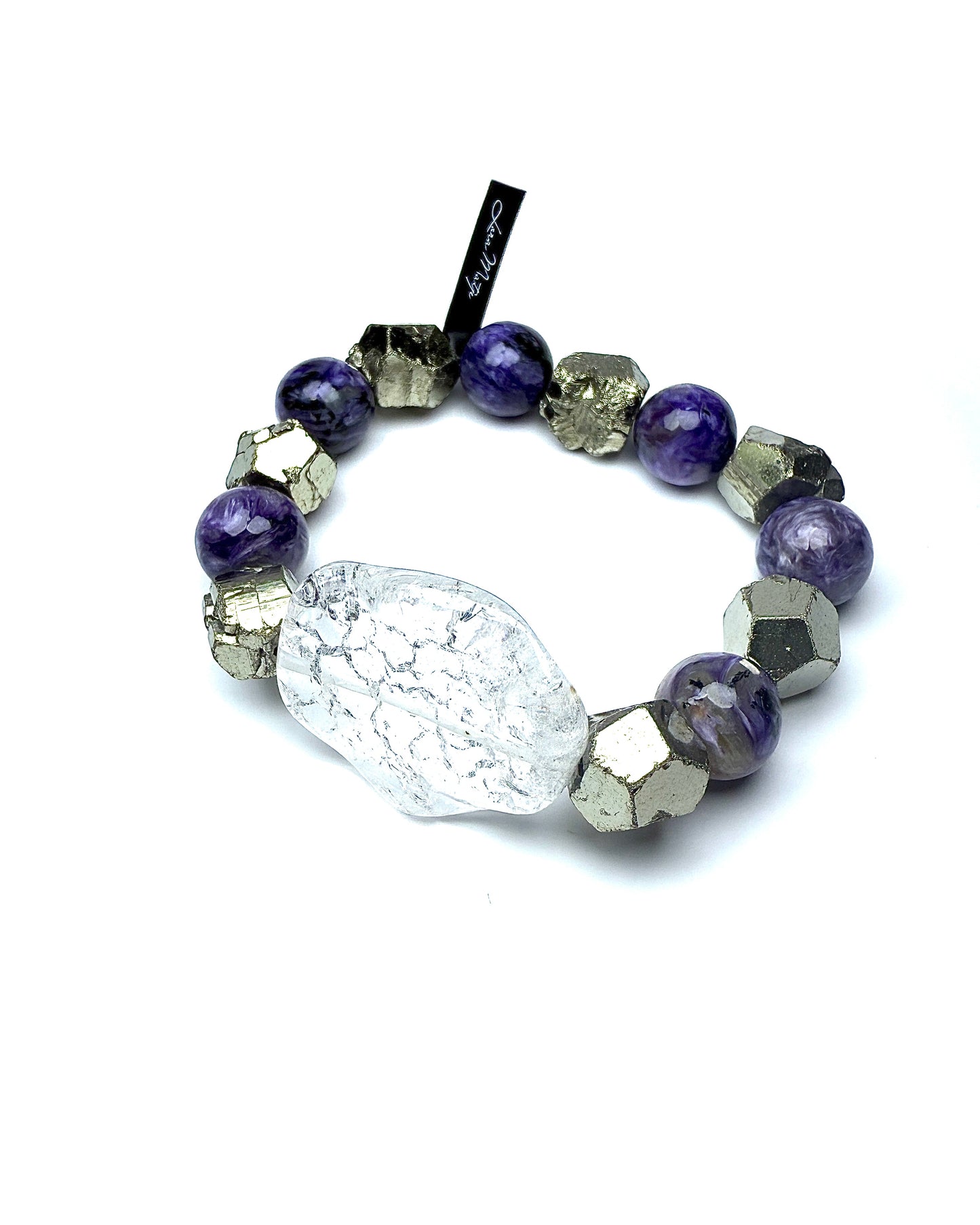 Charoite with Pyrite and Iris Crystal.