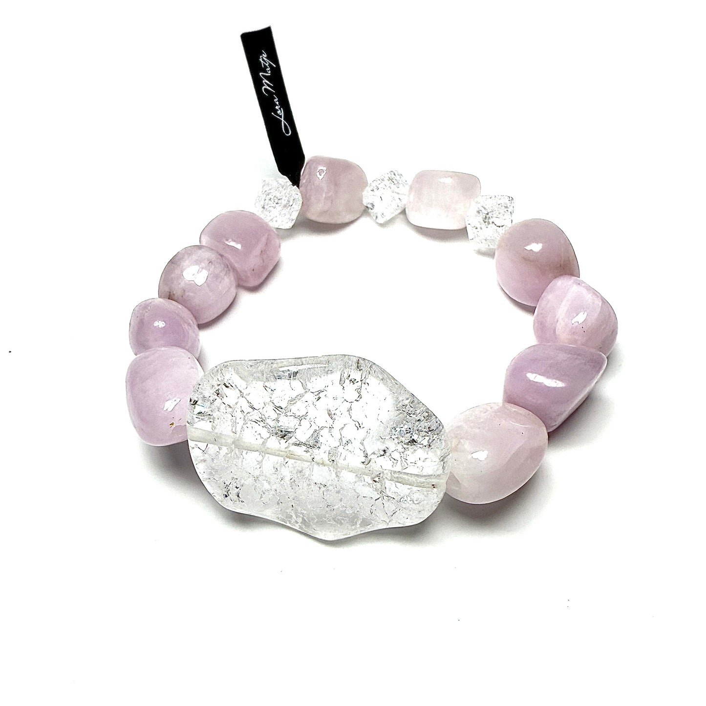 Kunzite with Iris Crystal.