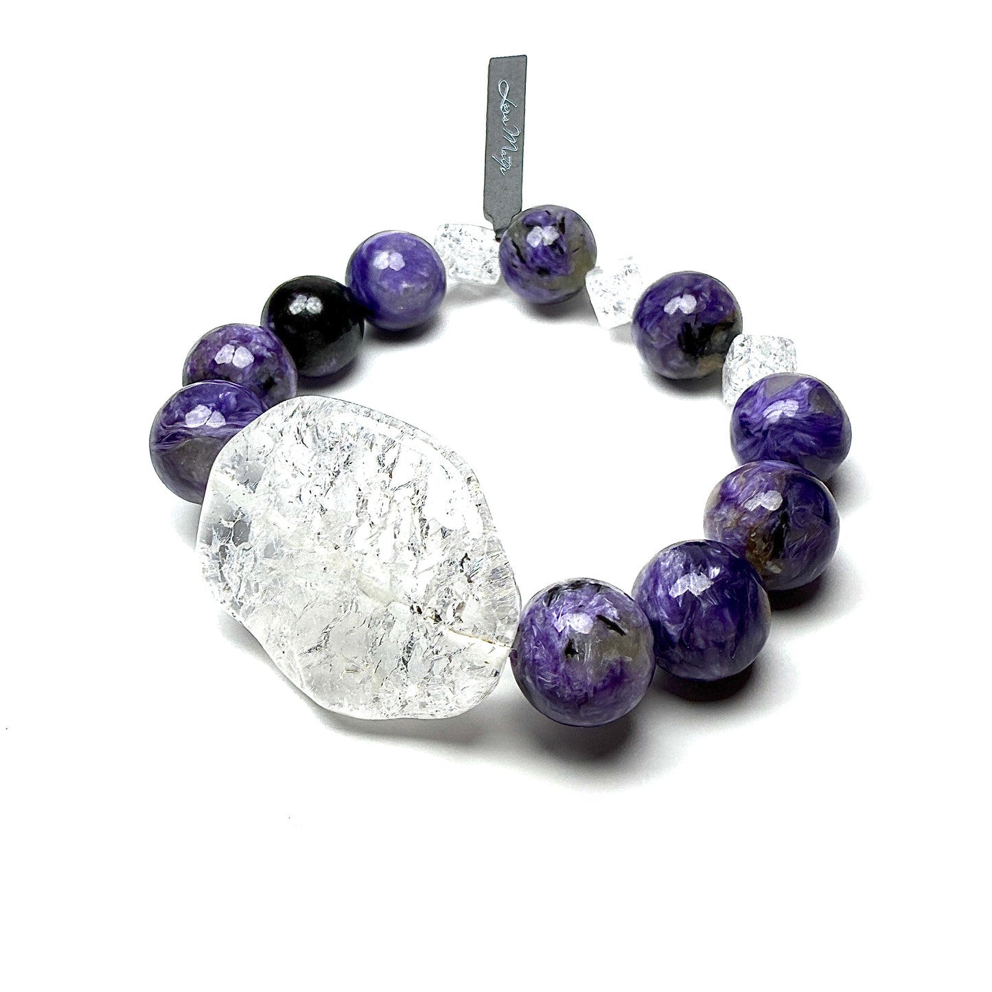Charoite with Iris Crystal.