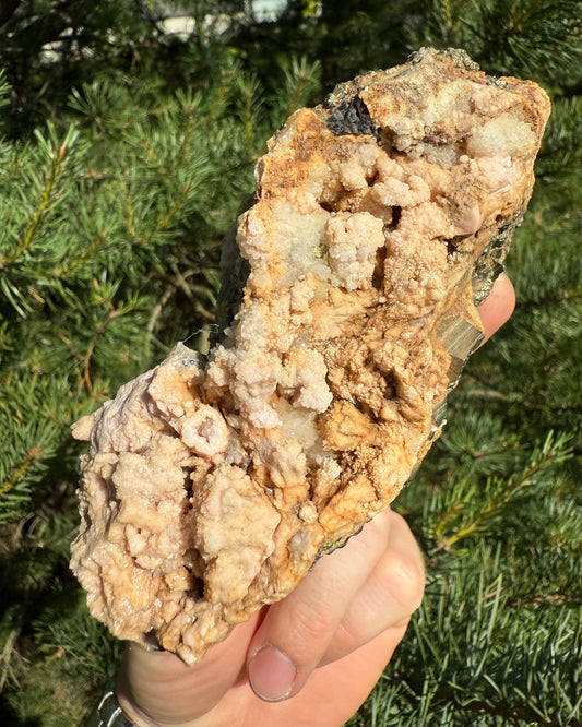 Rhodochrosite with Pyrite.